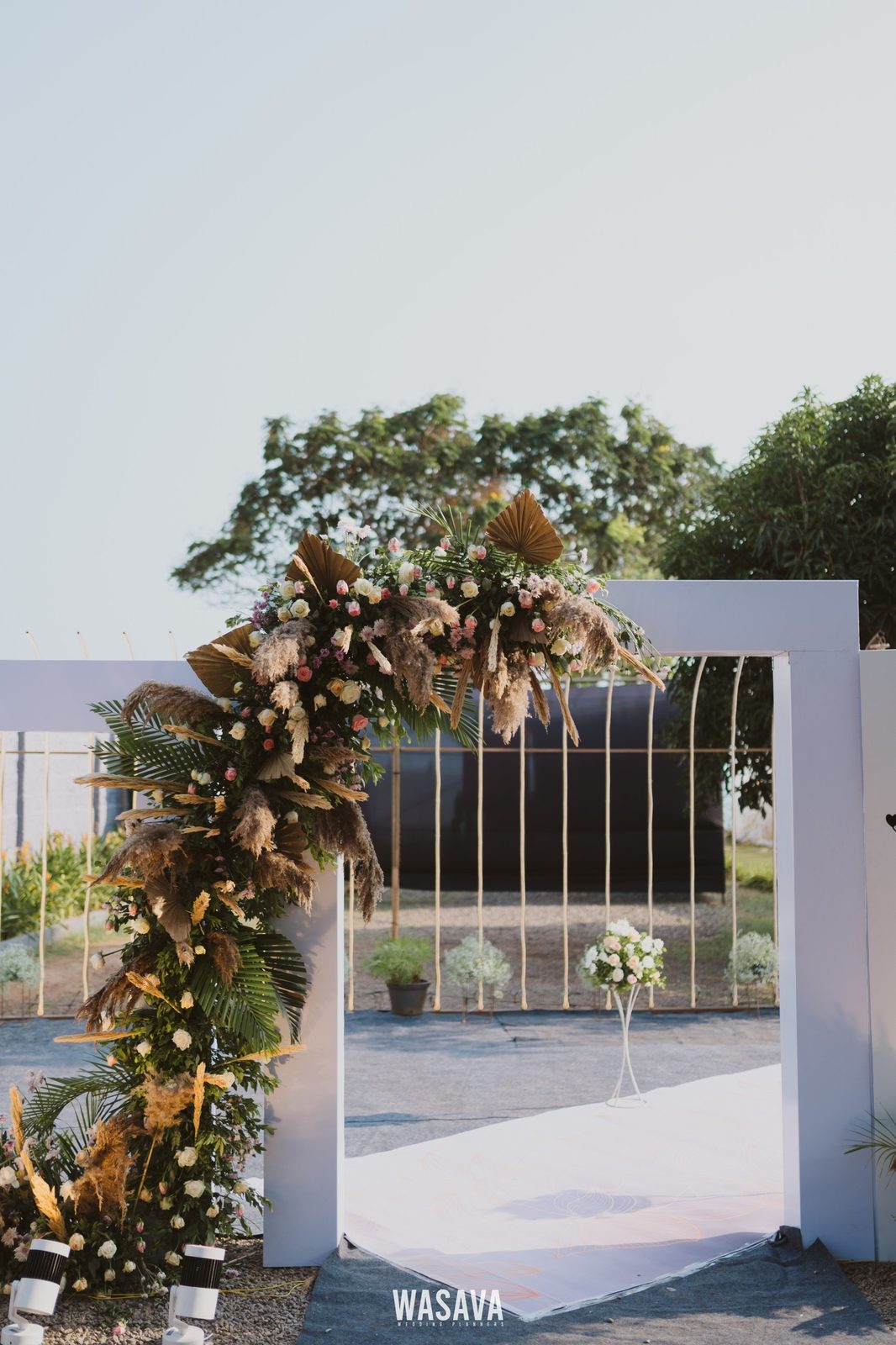 Sunlit Mandap Arch — stage & decor by Wasava Wedding Planners at Baby Beach, Kannur, Kerala