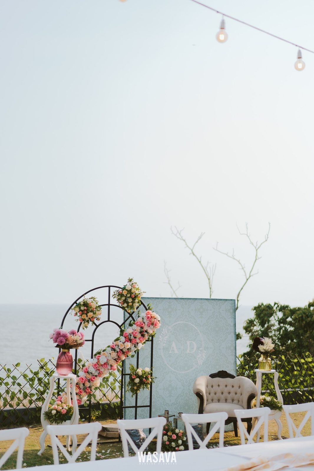Minimal Arch, Open Sky — stage & decor by Wasava Wedding Planners at Baby Beach, Kannur, Kerala