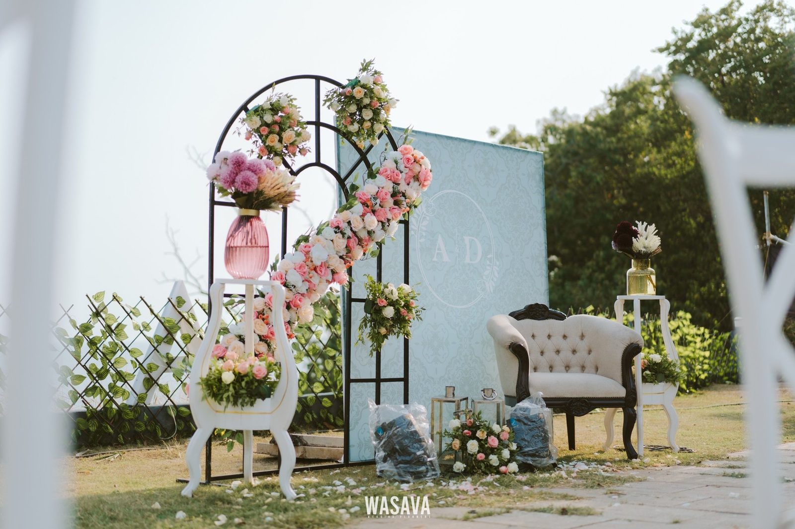 Sage Backdrop & Vintage Seating — stage & decor by Wasava Wedding Planners at Wasava Cliff House, Kannur, Kerala