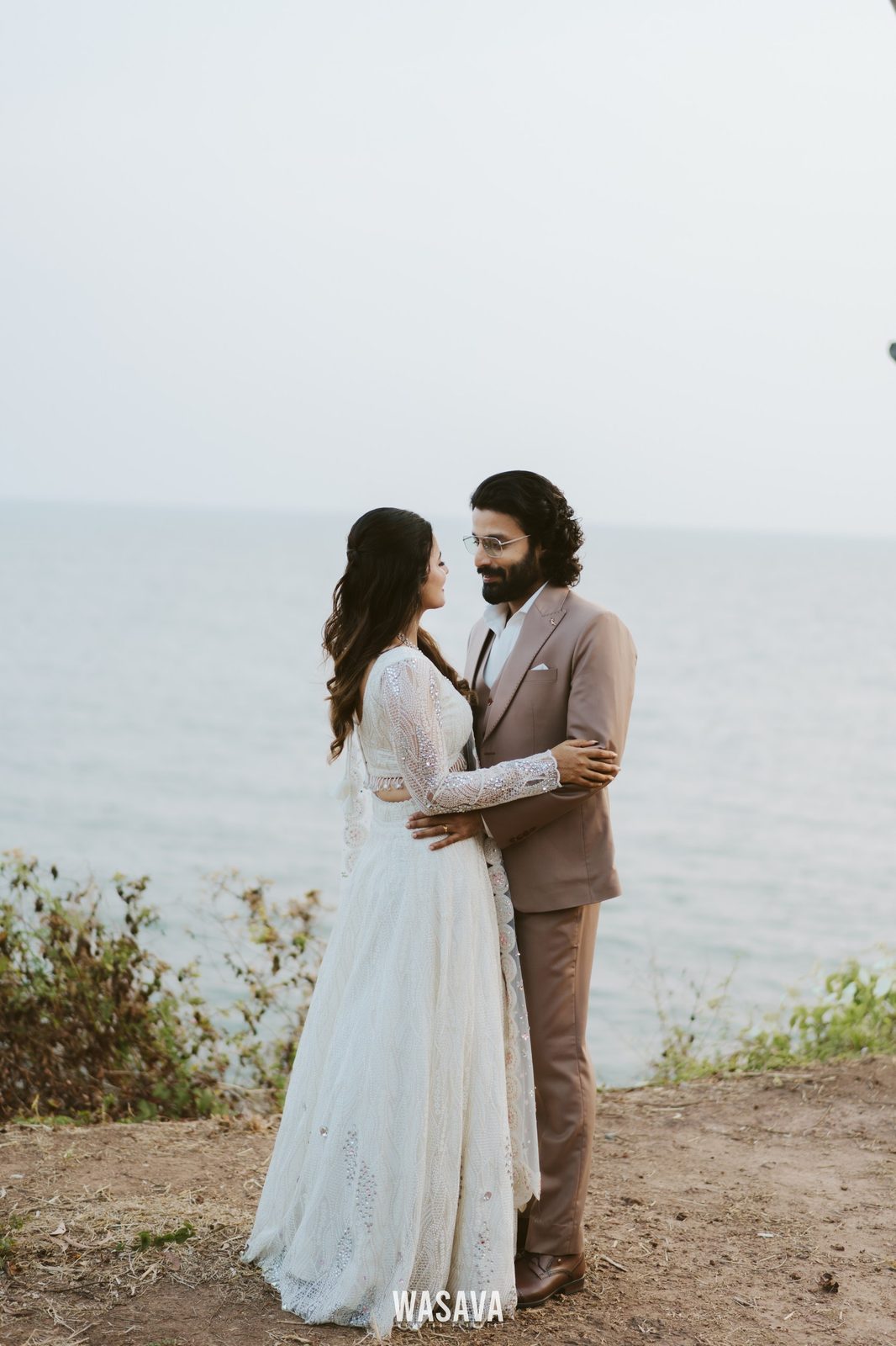 Portrait at the Cliff Edge — couple portraits by Wasava Wedding Planners at Baby Beach, Kannur, Kerala