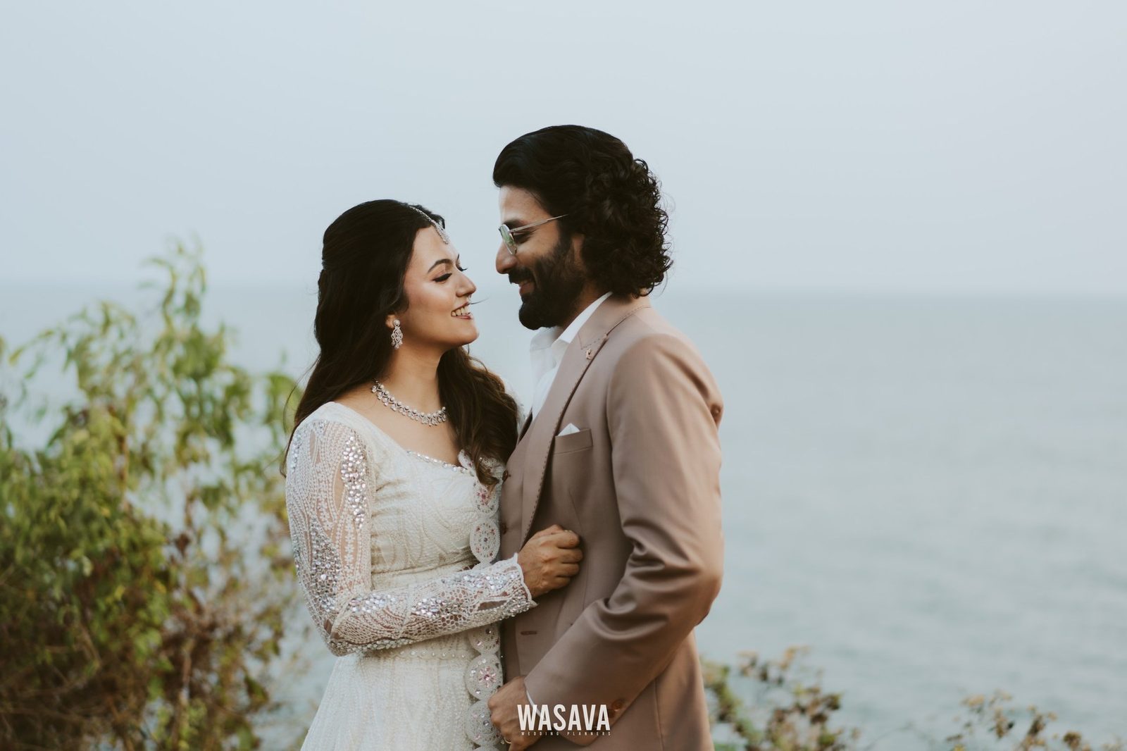 Between the Ceremonies — couple portraits by Wasava Wedding Planners at Baby Beach, Kannur, Kerala